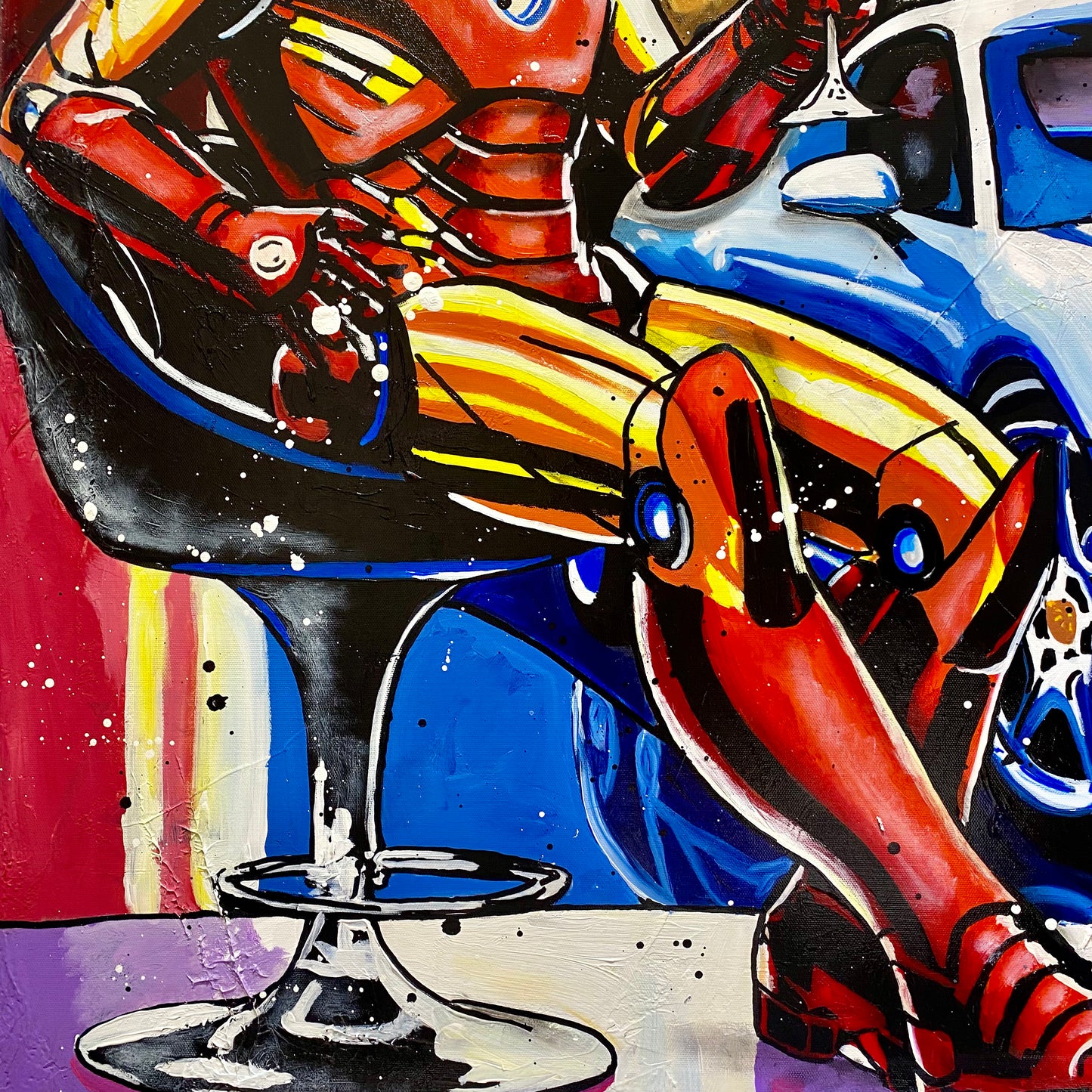 Iron Man enjoys a cocktail next to Porsche