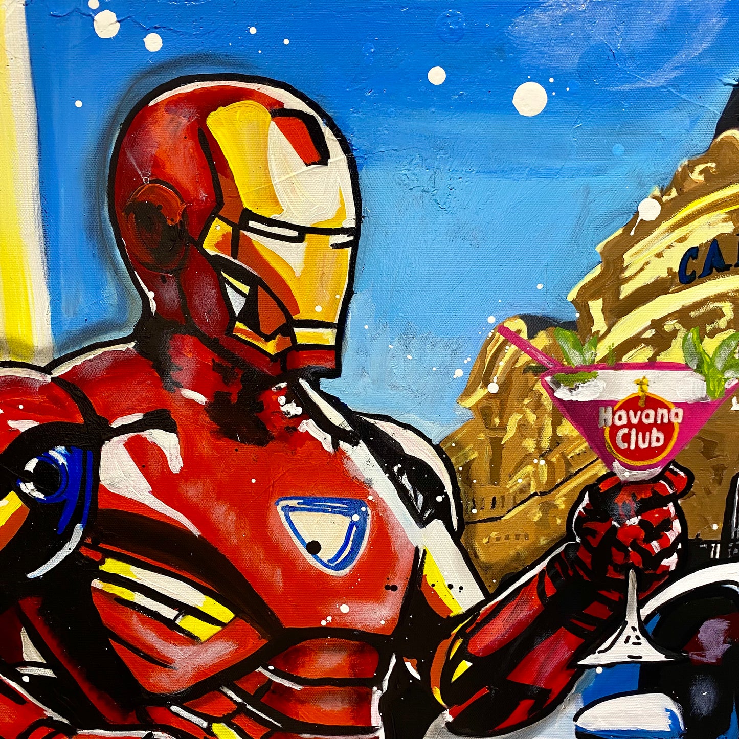 Iron Man enjoys a cocktail next to Porsche