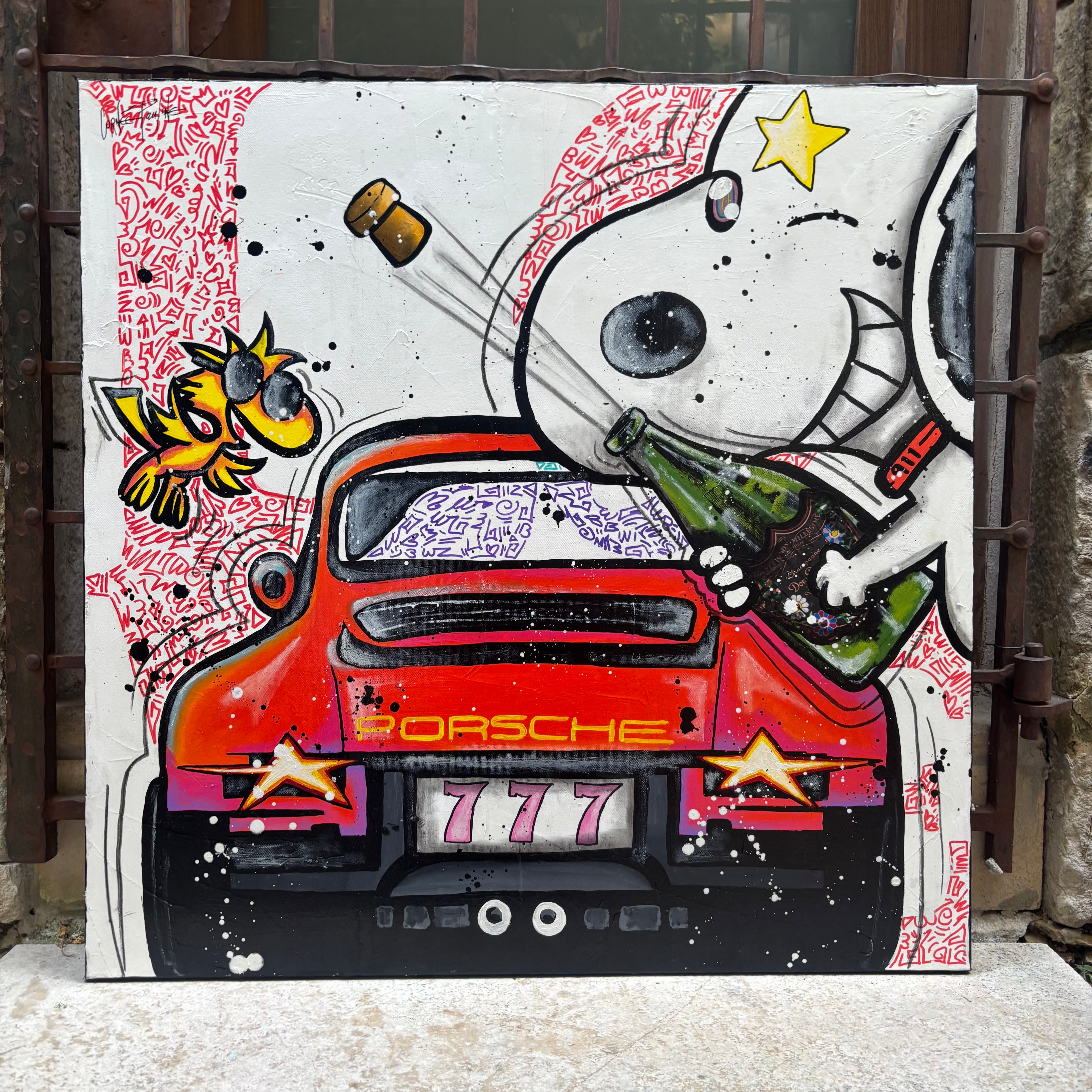 Snoopy is back in that Porsche